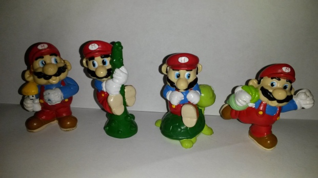 Applause Super Mario PVC figures. The one on the left I've had for 25 years or so. The others I got off of eBay. 
